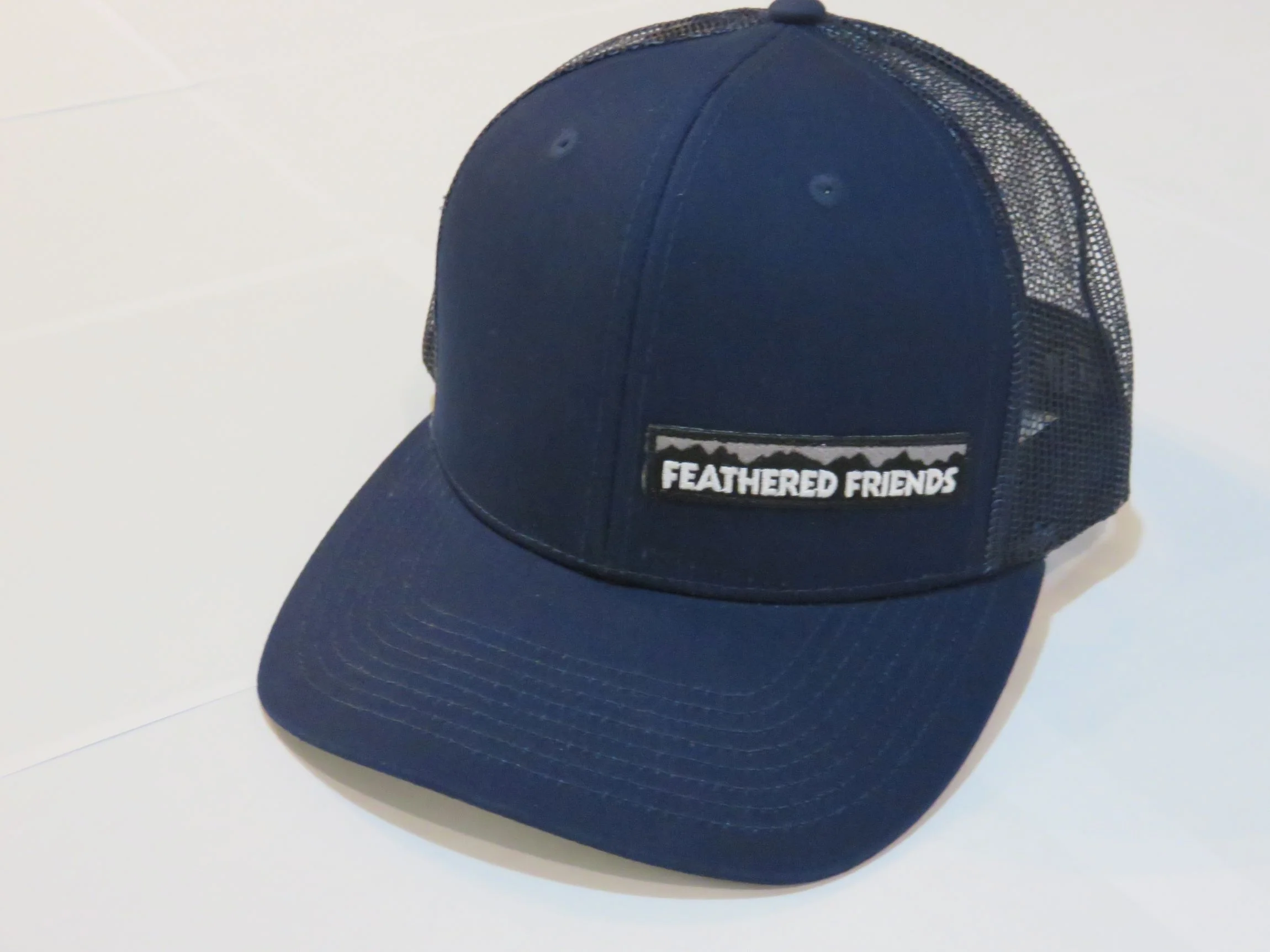 Feathered Friends Pro Style Trucker Offset Mountain Logo Patch Hat - Image 18