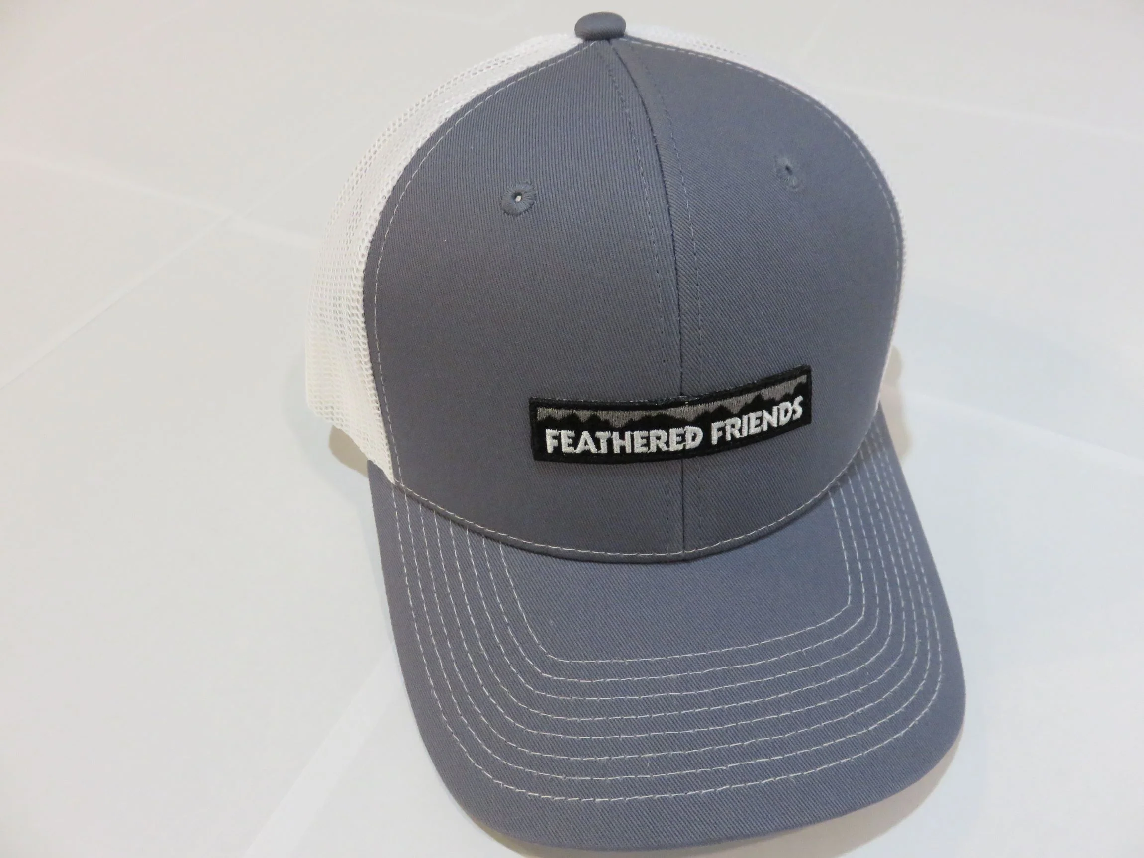 Feathered Friends Pro Style Trucker Mountain Logo Patch Hat - Image 15