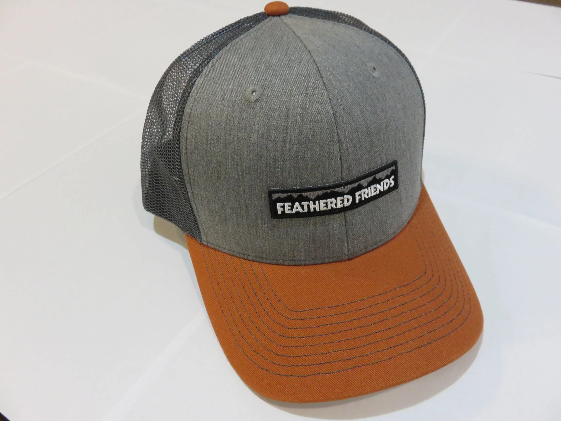 Feathered Friends Pro Style Trucker Mountain Logo Patch Hat - Image 23